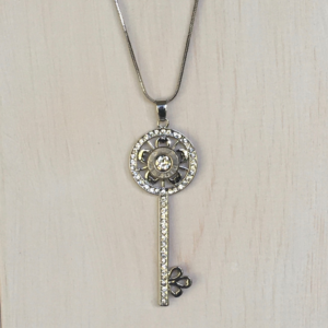 silver 45 caliber key necklace